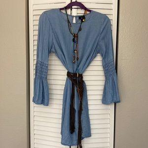 Denim look dress with bell sleeves.